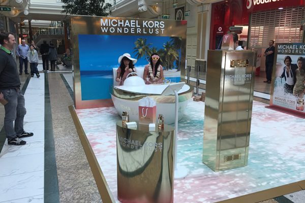 Blackjack Promotions, a leader in retail-focused experiential marketing, has delivered a complete package for the launch activity of Michael Kors’ new perfume, Wonderlust, in Manchester’s Trafford Centre, with the activation culminating at Birmingham’s Bull Ring today (October 4, 2016). Working from an initial brief and a 30’ TV ad, Blackjack developed the creative, designed the stand, created a social sharing mechanism, recruited and provided brand ambassadors, as well as full build and installation.