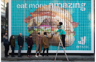 On-demand delivery service Deliveroo celebrated the fact that it has now delivered 10 million burgers in the UK since launch in 2013 with what it claims was the world’s first billboard made entirely out of burgers, all of which were free for passers-by to eat.